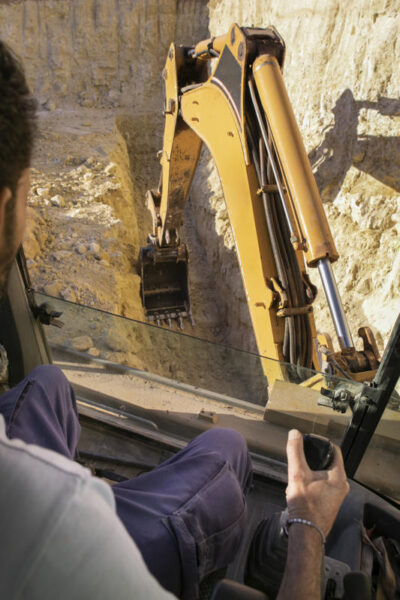 man-using-excavator-digging-day-light-533x800